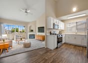 Thumbnail 1 of 24 - a spacious living room with a kitchen and a living room