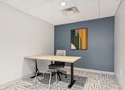Thumbnail 26 of 26 - a meeting room with a table and chairs