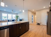 Thumbnail 48 of 53 - a kitchen and living room in a new home