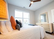 Thumbnail 8 of 53 - a bedroom with a large bed and a window