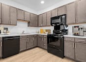 Thumbnail 14 of 16 - Kitchen with cabinets at 36N Apartments, Oklahoma, 74106