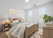 Thumbnail 11 of 16 - Bedroom with windows at 36N Apartments, Tulsa, Oklahoma