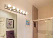 Thumbnail 6 of 64 - Apartment bathroom with vanity, shower tub combo