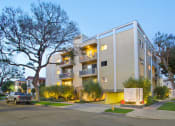 Thumbnail 8 of 64 - Exterior street view of an apartment building