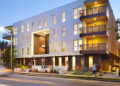 Thumbnail 51 of 64 - Exterior street view of an apartment building