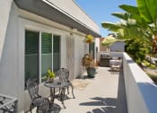 Thumbnail 20 of 64 - Apartment balcony with BBQ/grill and outdoor furniture