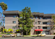 Thumbnail 37 of 64 - Exterior front view of an apartment building