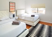 Thumbnail 39 of 64 - Apartment bedroom with wood flooring