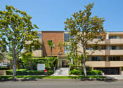 Thumbnail 29 of 64 - Exterior front view of an apartment building