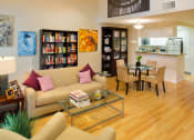 Thumbnail 43 of 64 - Apartment living room with high ceilings, kitchen and dining area