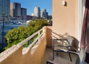 Thumbnail 47 of 64 - Apartment balcony with street and treetop views