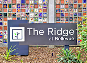 Thumbnail 11 of 28 - A sign that says The Ridge at Bellevue in front of a wall of tiles.