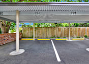 Thumbnail 20 of 28 - A parking lot with numbered parking spaces 150 to 152.