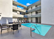 Thumbnail 2 of 14 - Pool With Relaxing Area at City Park View, Los Angeles, CA