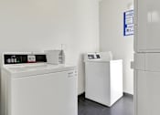 Thumbnail 13 of 16 - Laundry Room at Barton Apartments, Los Angeles, 90038
