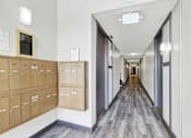 Thumbnail 10 of 19 - Long hallway with multiple mailboxes at Occidental Apartments, Los Angeles, CA, 90057