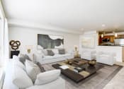 Thumbnail 32 of 52 - a living room with white couches and a coffee table  at Delano, Redmond, 98052