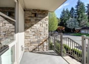 Thumbnail 13 of 52 - a balcony with a view of a street and trees at Delano, Washington