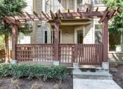 Thumbnail 10 of 52 - the front porch of a house with a wooden deck at Delano, Redmond, 98052