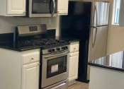 Thumbnail 4 of 6 - Fully Equipped Kitchen at Elmwood Gardens, Burbank, 91502