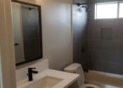 Thumbnail 10 of 12 - Bathroom With Modern Design and Details at Wilson Apartments in Glendale, CA