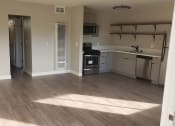 Thumbnail 12 of 12 - Living Room Space Near Kitchen and Dining Are at Wilson Apartments in Glendale, CA