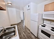 Thumbnail 20 of 35 - Kitchen with white appliances at Mountain Vista, Sierra Vista, AZ, 85635