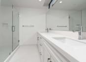 Thumbnail 10 of 11 - Bathroom area at The Lucky Apartments, Culver City, California