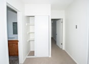 Thumbnail 10 of 27 - #215 2bd/2ba hallway with shelving