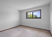 Thumbnail 6 of 22 - an empty room with a window in it