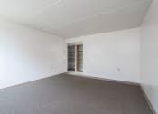 Thumbnail 8 of 21 - an empty room with a carpet and white walls
