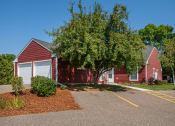 Thumbnail 5 of 19 - a red house with a tree in front of it
