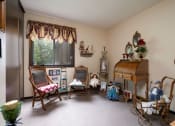Thumbnail 11 of 18 - a living room filled with dolls and furniture and a piano