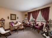 Thumbnail 7 of 18 - a living room filled with furniture and a window
