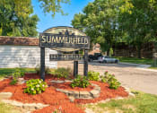 Thumbnail 1 of 19 - the sign in front of the apartments parking lot