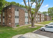 Thumbnail 4 of 20 - our apartments offer a parking lot for your car