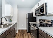 Thumbnail 17 of 34 - Modern Kitchen at Oxbow Hill Country, Boerne, Texas