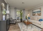 Thumbnail 29 of 34 - Living Room with Chair at Oxbow Hill Country, Boerne, 78006