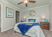 Thumbnail 23 of 34 - Bedroom with a Large Bed and Nightstand at Oxbow Hill Country, Boerne