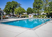 Thumbnail 62 of 80 - A large swimming pool surrounded by trees and a fence.at Addison at Sutherland, Tennessee  