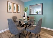 Thumbnail 10 of 80 - A dining room with a table and chairs.at Addison at Sutherland, Knoxville Tennessee  
