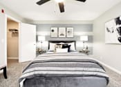 Thumbnail 51 of 80 - A bedroom with a large bed and a ceiling fan.at Addison at Sutherland, Knoxville, TN  