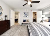 Thumbnail 53 of 80 - A bedroom with a large bed and a ceiling fan.at Addison at Sutherland, Knoxville Tennessee  