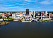 Thumbnail 34 of 34 - an aerial view of the city with a river and a city