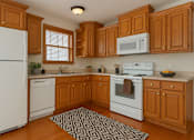 Thumbnail 6 of 14 - A kitchen with wooden cabinets and white appliances.