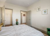 Thumbnail 61 of 62 - a bedroom with a large bed and two doors at 41 North Apartments, Fort Wayne, 46835