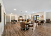 Thumbnail 30 of 62 - Spacious dining room with tables and chairs at 41 North Apartments, Fort Wayne