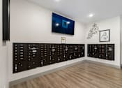 Thumbnail 48 of 62 - room with lockers and a television on the wall at 41 North Apartments, Fort Wayne, 46835