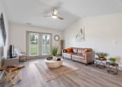 Thumbnail 8 of 43 - a living room with a couch and a coffee table at Morada at Maysville, Fort Wayne, IN 46815