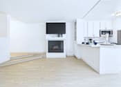 Thumbnail 42 of 49 - A modern kitchen with a white cabinet and a white island.